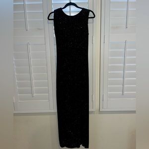 Betsy & Adam Black sparkling gown with a low back.